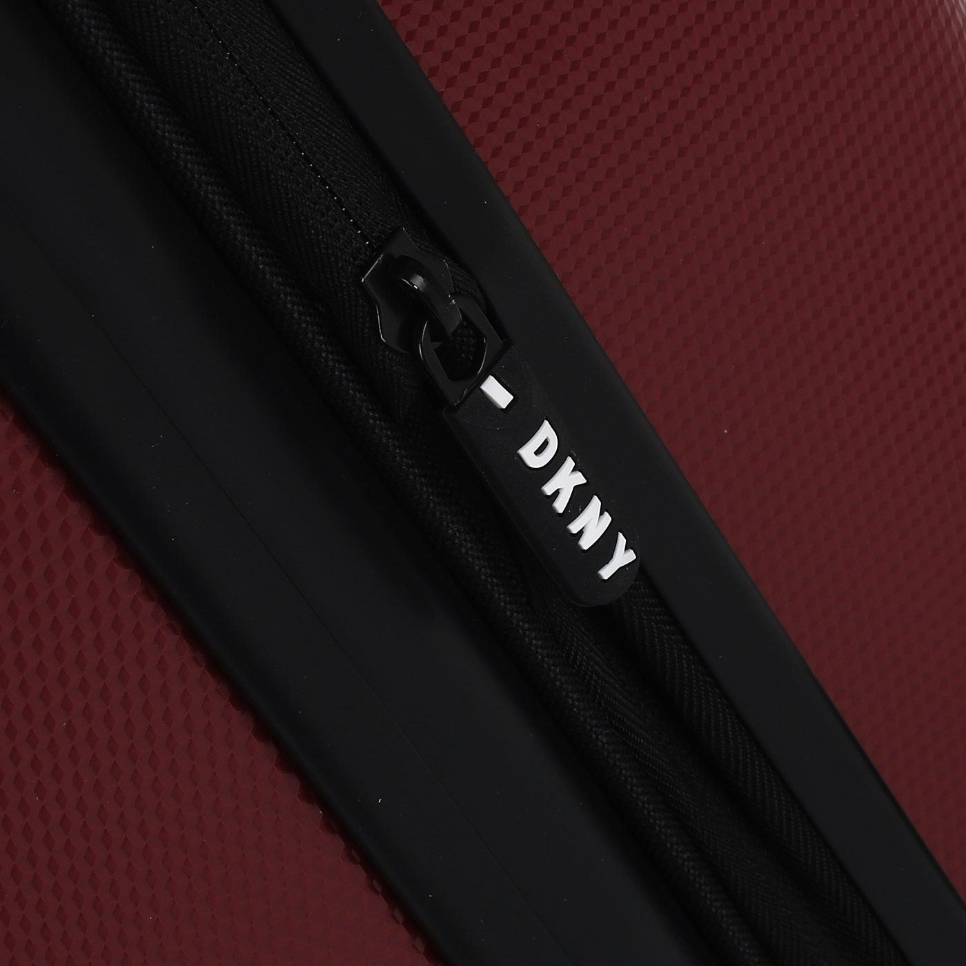 Чемодан средний M из ABS-пластика с кодовым замком DKNY DKNY-312 Unlimited