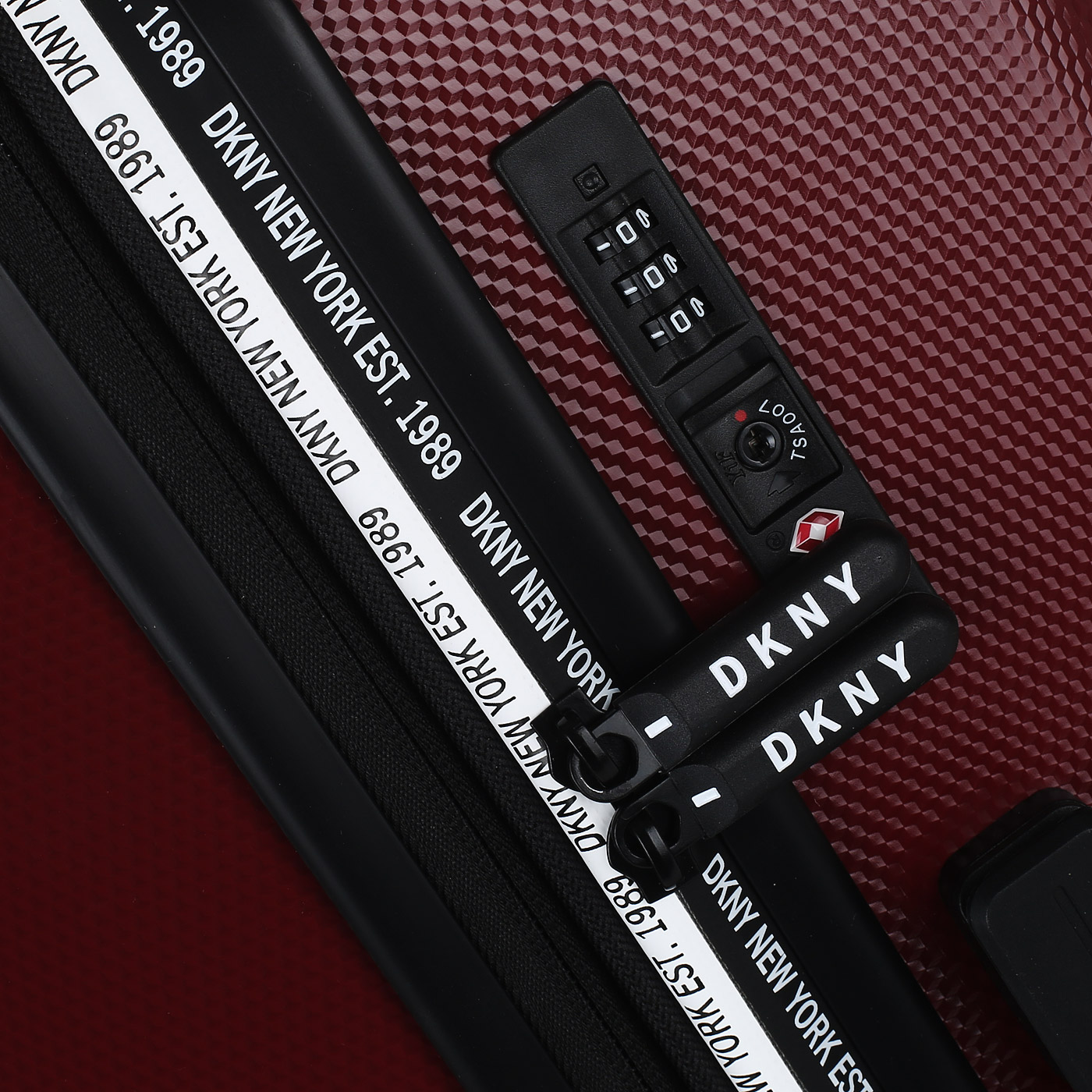 Чемодан средний M из ABS-пластика с кодовым замком DKNY DKNY-312 Unlimited